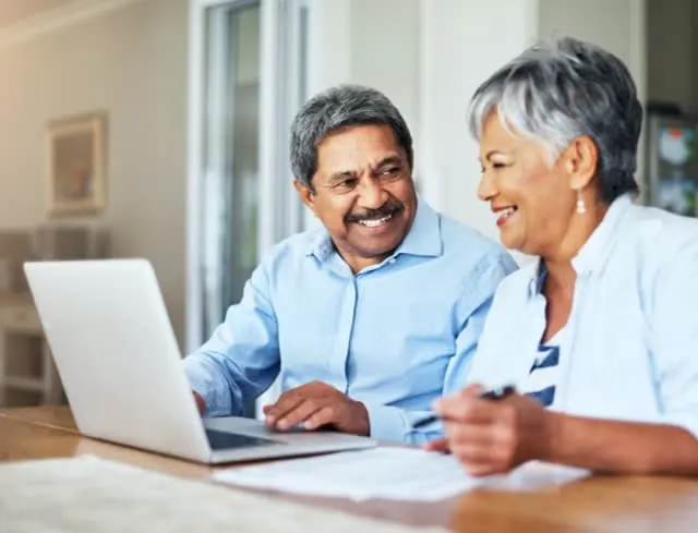 Couple applying on a laptop